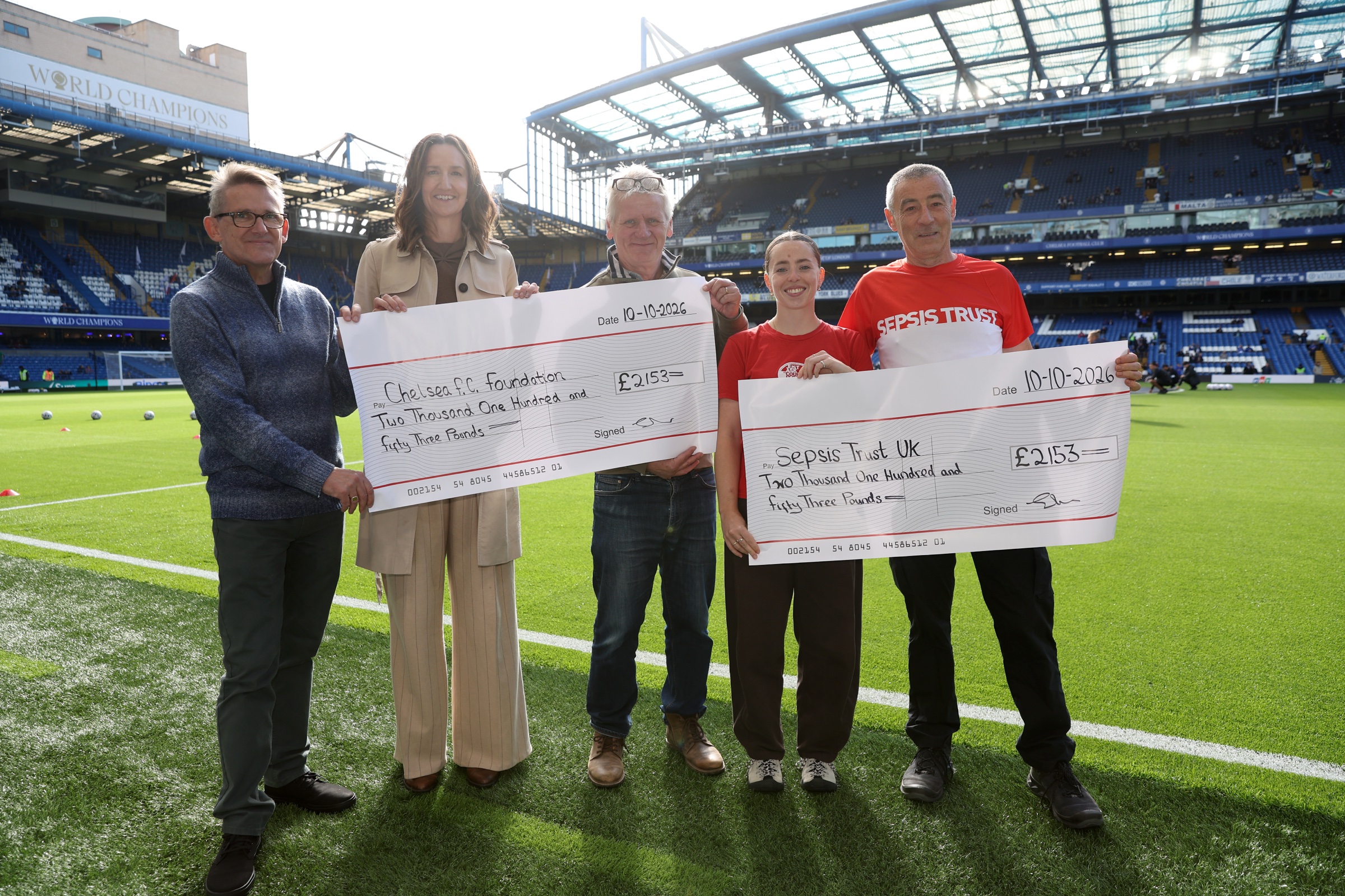 CSG members, and helpers on the day, Paul Oppenheimer and Mark Boswood handed the cheques over to Steve and Ava Pevsner from UK Sepsis Trust and, Laura Cordingley, CEO of The Chelsea Foundation.